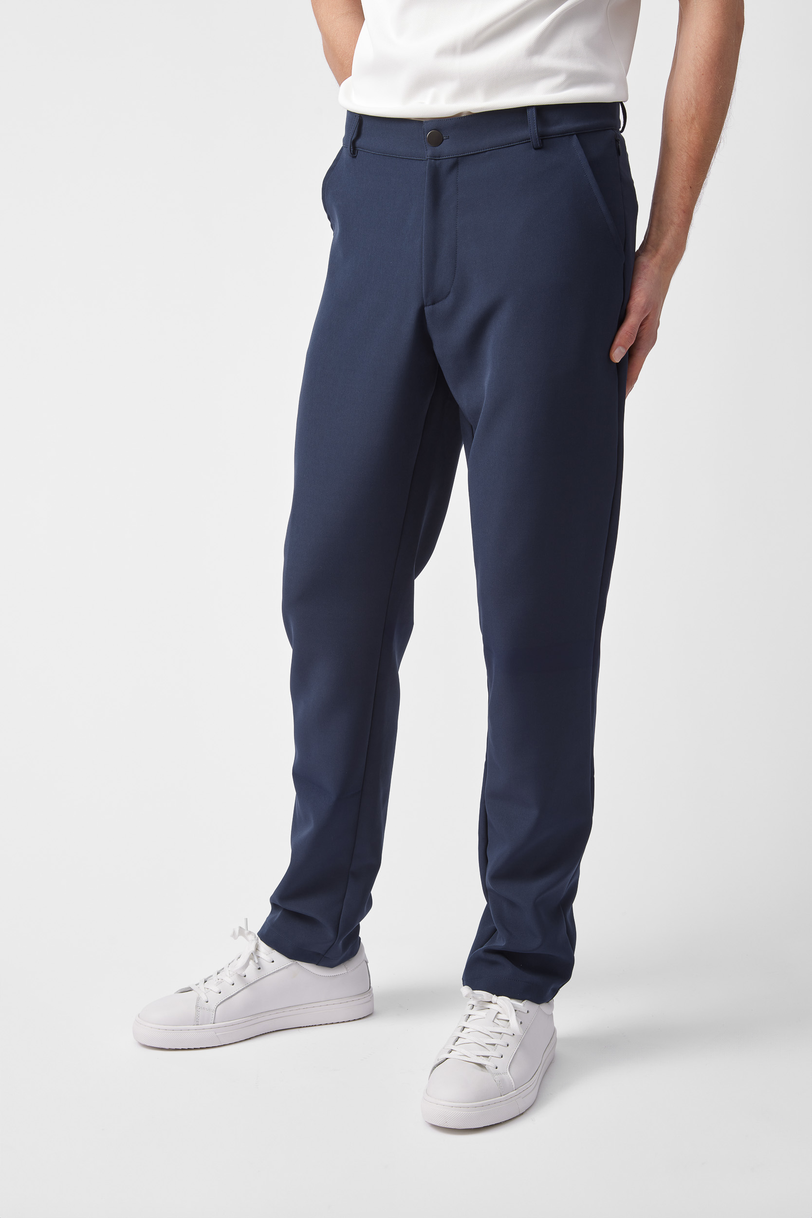 men's navy trousers and fresh white trainers